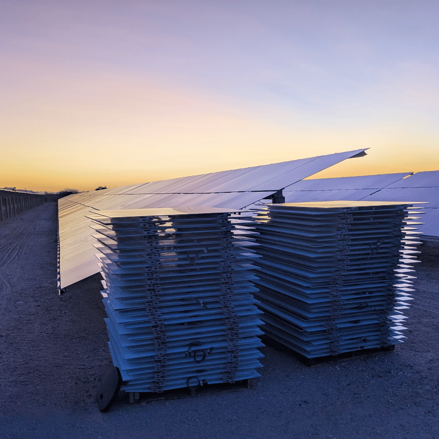 Comstock Metals field team handling solar panels during decommissioning