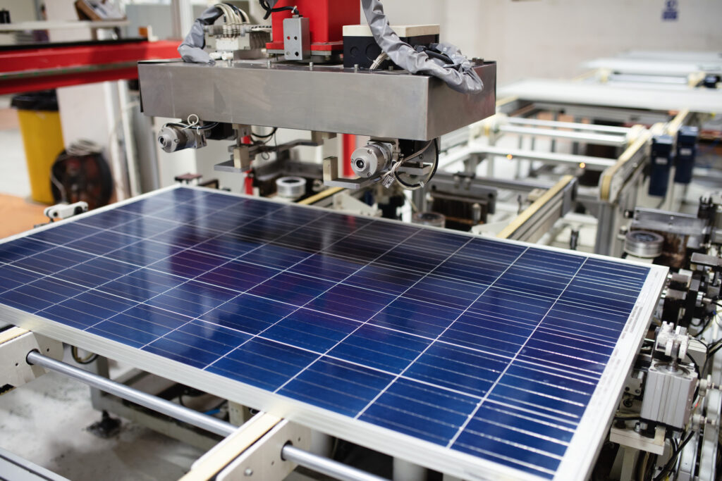 Image of manufacturing of solar panel system in factory.